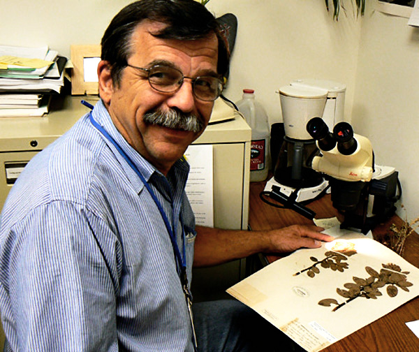 Dr. Gary D. Wallace in his botany lab. Photo courtesy U.S. FWS.